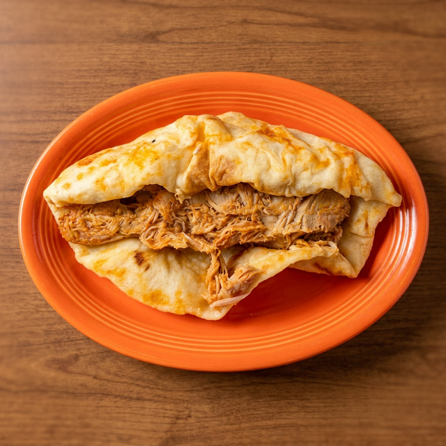 Pollo Guisado Taco.
